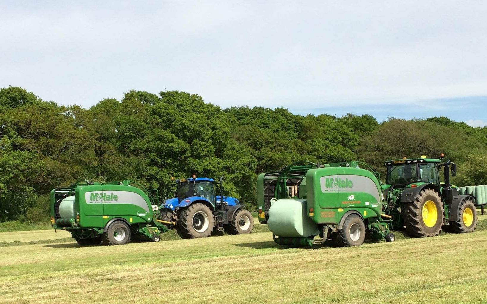 Hooftrimming ltd with Round baler at United Kingdom