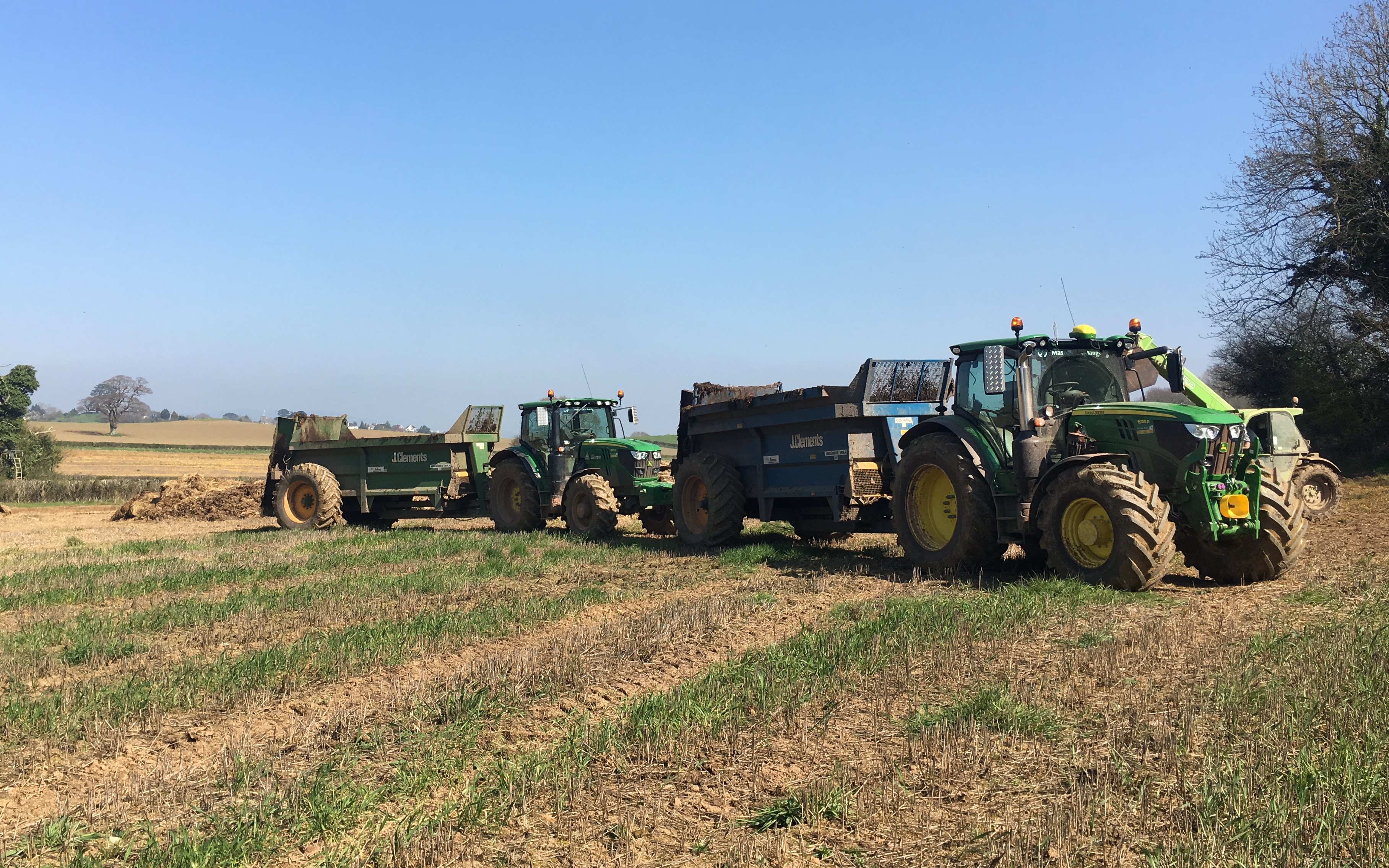 John clements contracting ltd with Manure/waste spreader at Camomile Way
