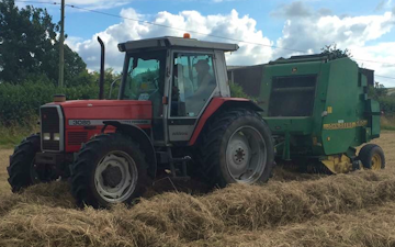Jw agricultural services  with Round baler at Vincent Way