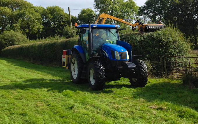 S.redfern & son with Hedge cutter at United Kingdom