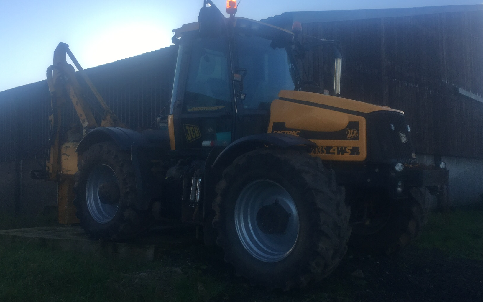 Stuart deans agriculture with Hedge cutter at Kilmaurs