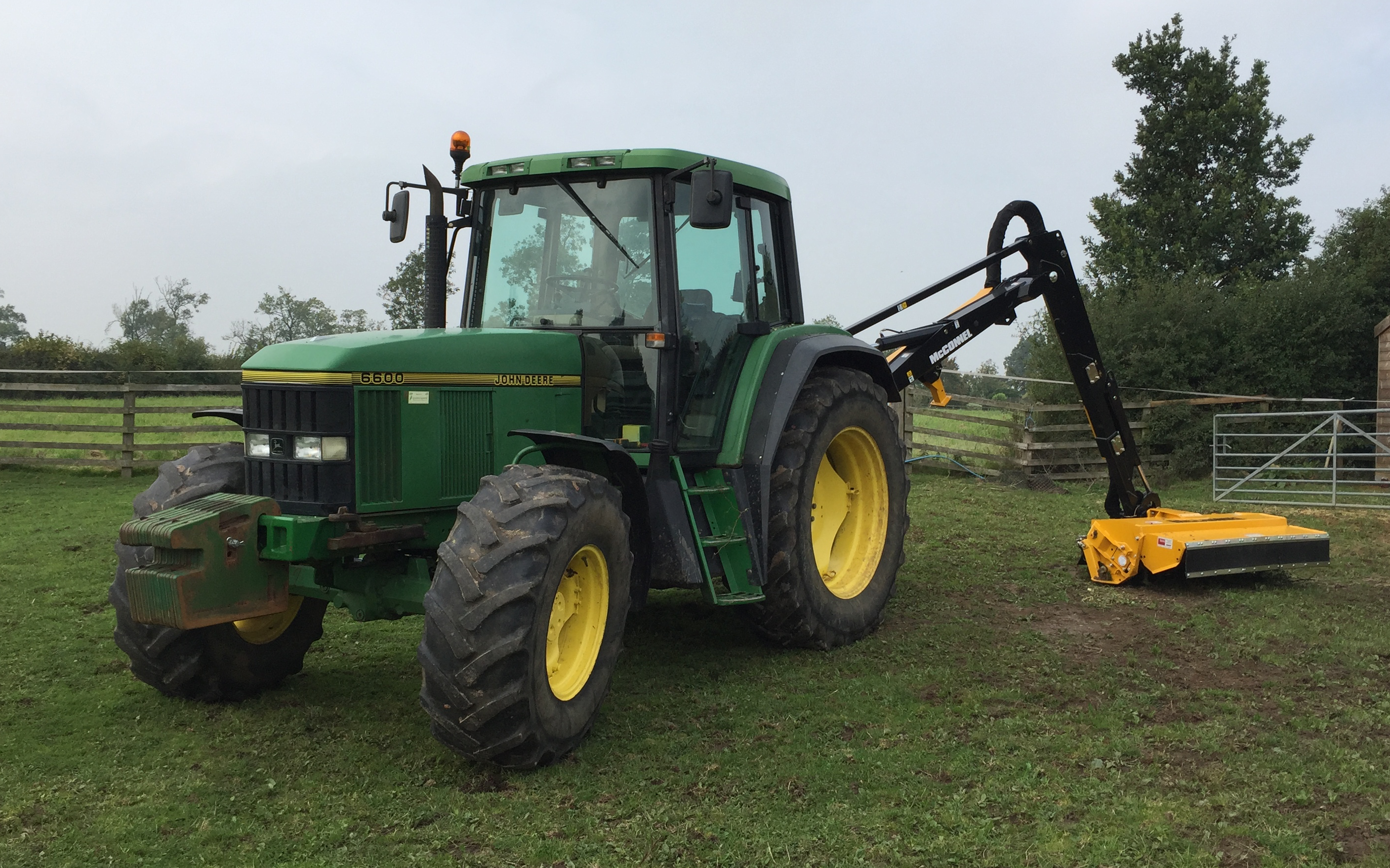 Dan burton eggriculture  with Hedge cutter at United Kingdom