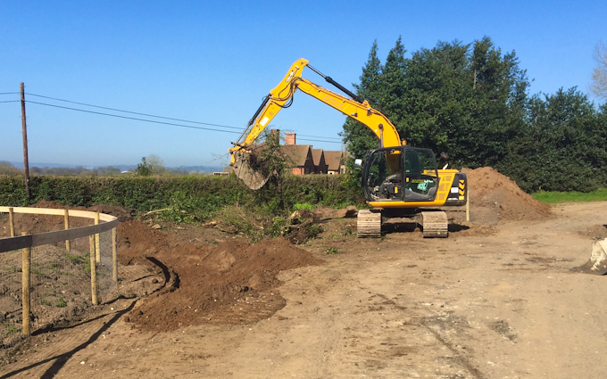 Sas land services  with Excavator at United Kingdom