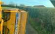 A. farrell contracting with Hedge cutter at United Kingdom