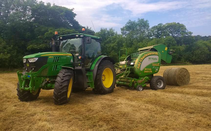 A & sj charlesworth farmers and contractors with Round baler at Loxley