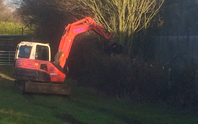Bennett's contracting with Hedge cutter at United Kingdom