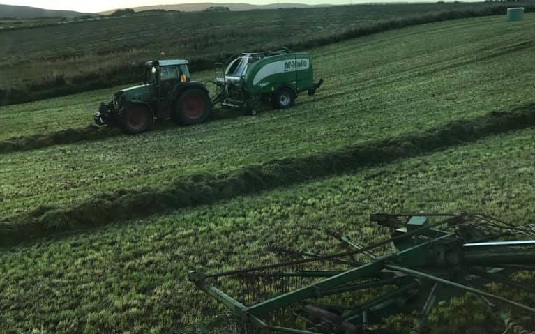 C j phillips contracting with Round baler at Thornbury