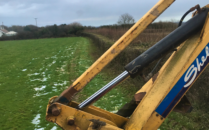 D popham contracting  with Hedge cutter at United Kingdom