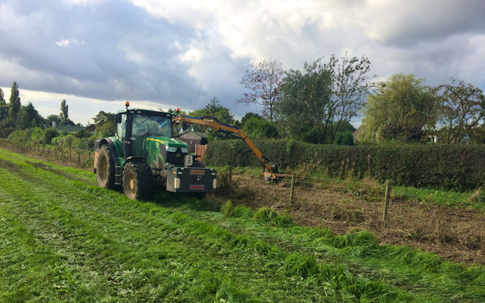 S.t.anderton agricultural contracting  with Hedge cutter at Chorley