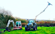 Hedge cutting services  with Hedge cutter at Lyme Regis