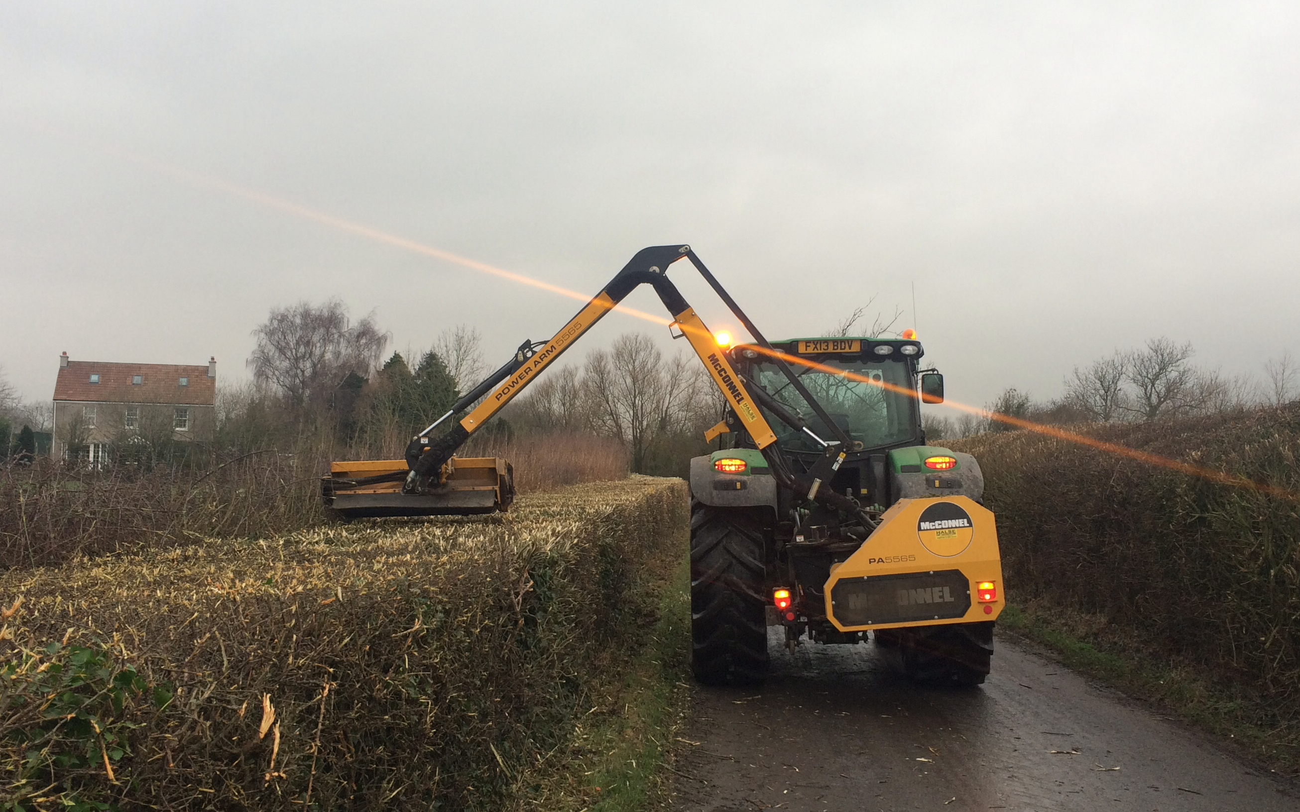 A c harris contracting  with Hedge cutter at Kingston Seymour