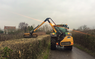 A c harris contracting  with Hedge cutter at Kingston Seymour