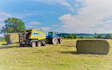 Oakfield contracting with Large square baler at United Kingdom