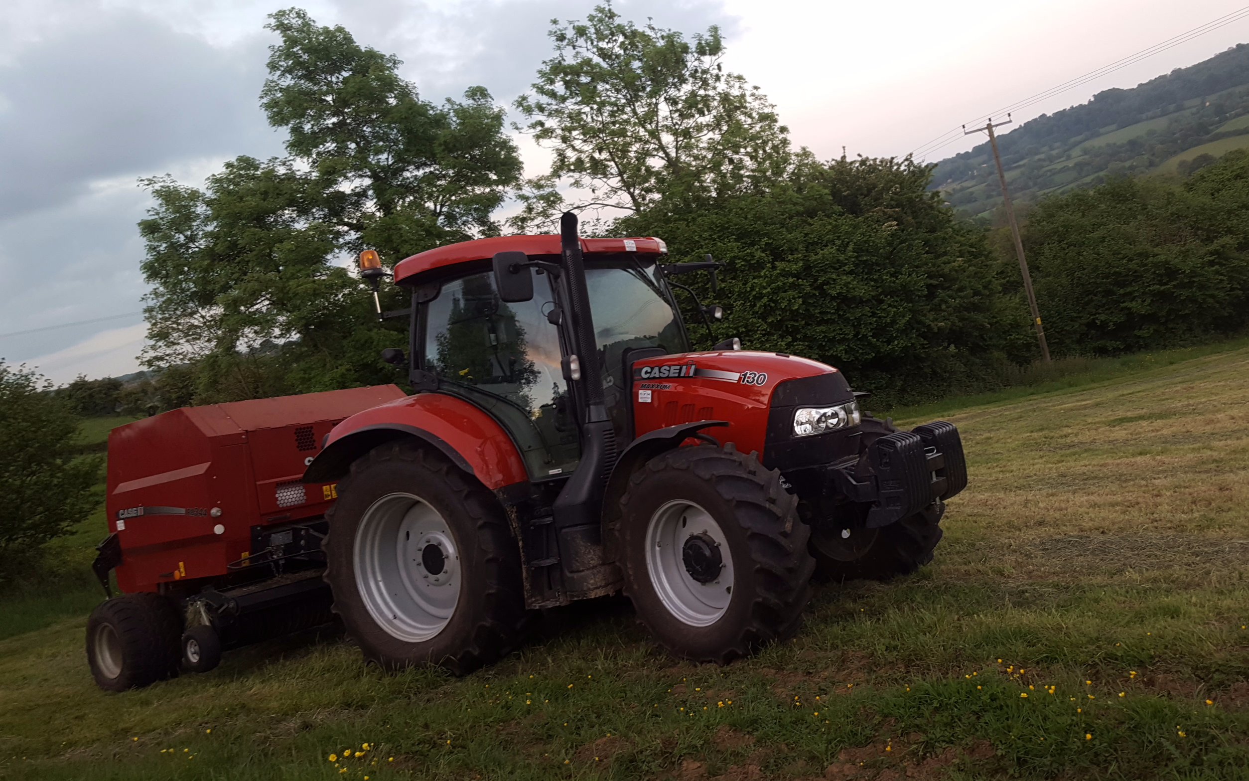 M.s & p slinger with Round baler at Edge