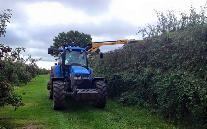 Pg groundcare ltd with Hedge cutter at Hollybank