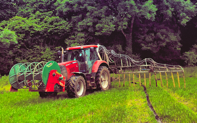 Powells contracting  with Slurry spreader/injector at Hay-on-Wye