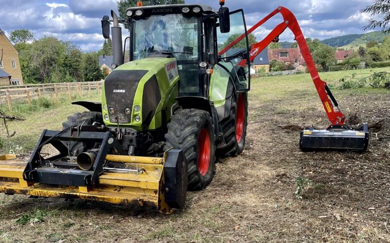 Kaleb cooper contracting ltd with Verge/flail Mower at Heythrop