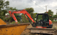 Spencer & sons agricultural services with Excavator at United Kingdom