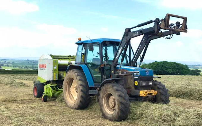 Scott walton contracting  with Round baler at United Kingdom
