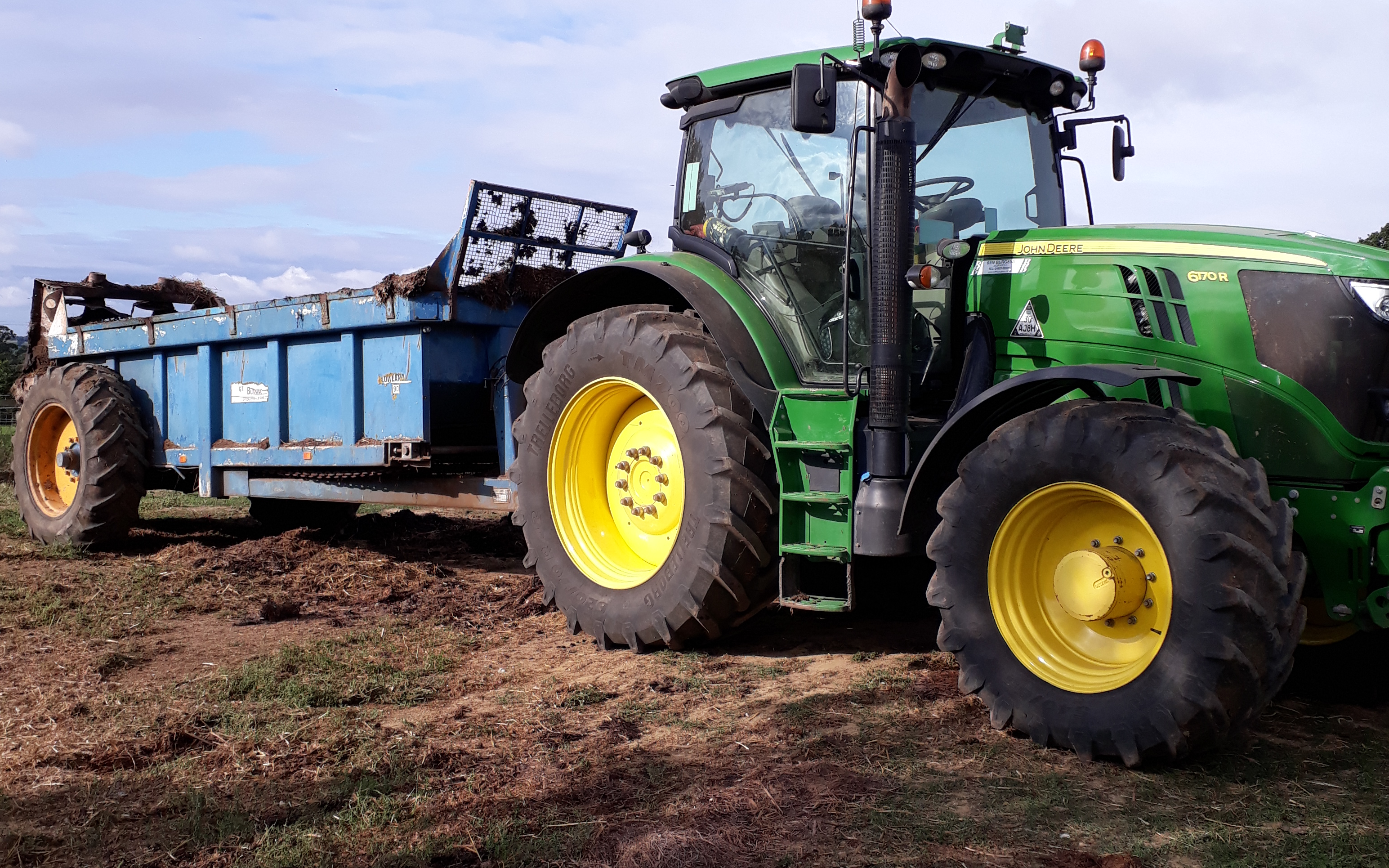 A j agriculture services  with Manure/waste spreader at Lowestoft