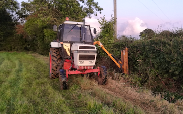 F. roberts agri services  with Hedge cutter at Framlingham