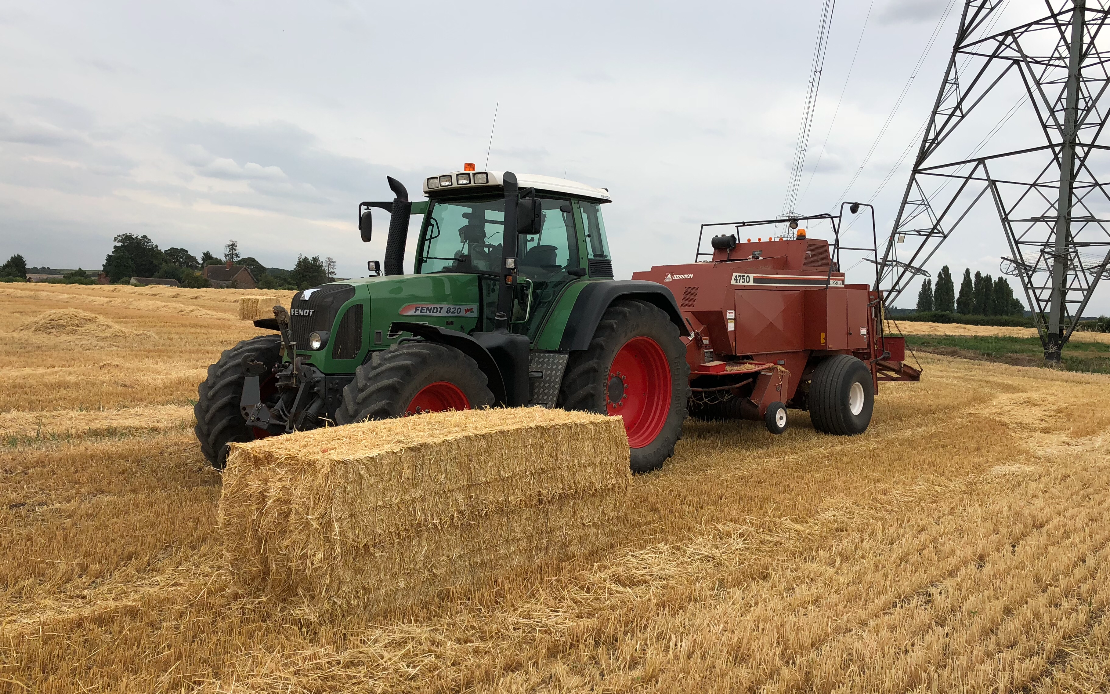 Dan ablewhite  with Large square baler at United Kingdom