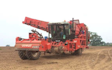 Russell price farm services with Potato harvester at Castle Frome