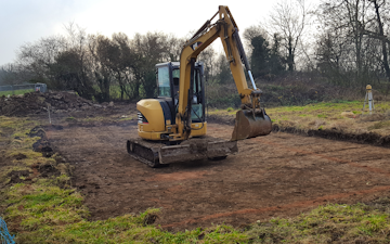 Murray farms ltd with Mini digger at Cressage