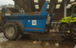 Dan beaumont with Large square baler at United Kingdom