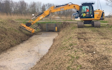 R p thain  with Ditch cleaner at United Kingdom