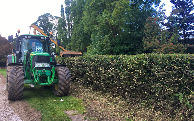 Cheshire hedge cutting  with Hedge cutter at Racecourse Lane