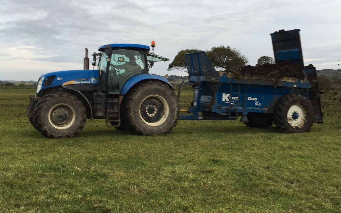 Camddwr contractors cyf with Manure/waste spreader at United Kingdom