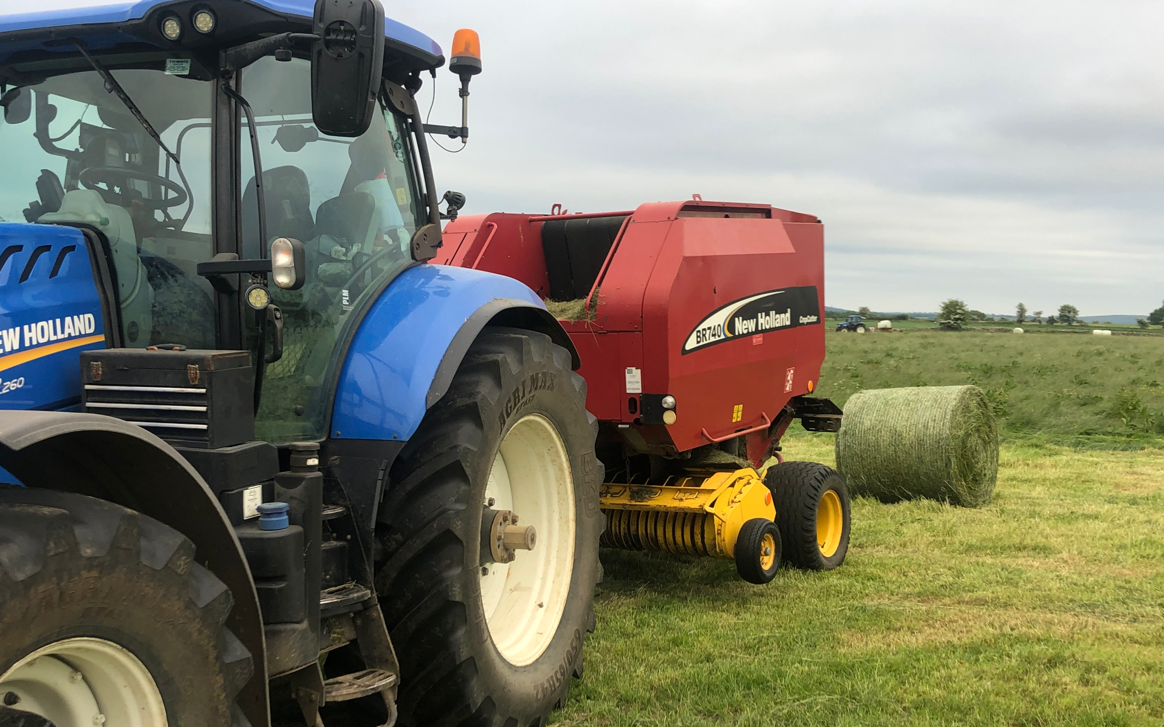 Rob jones with Small square baler at Cheltenham