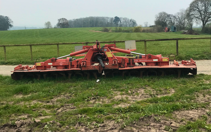 Powells contracting  with Power harrow at Hay-on-Wye