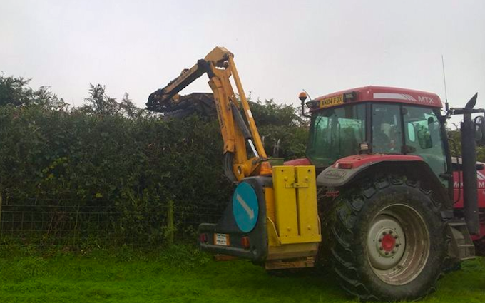 Trever verran agriculture contracting with Hedge cutter at Duloe