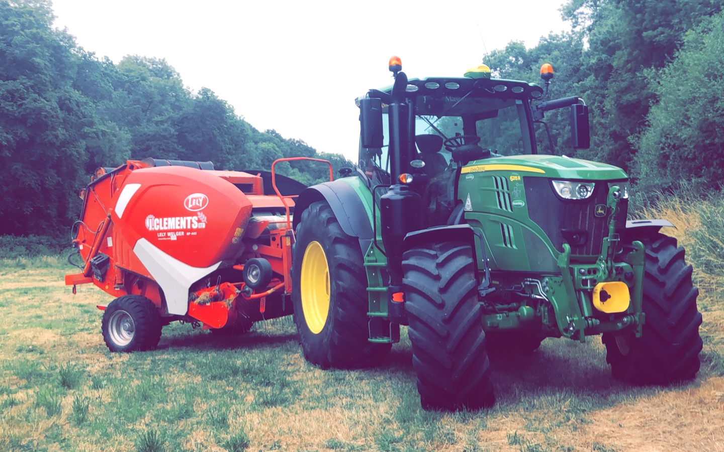 John clements contracting ltd with Round baler at Camomile Way
