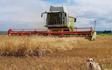 Clarke farms ltd with Combine harvester at Lowdham