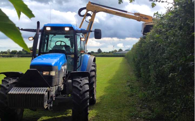 Pg groundcare ltd with Hedge cutter at Hollybank