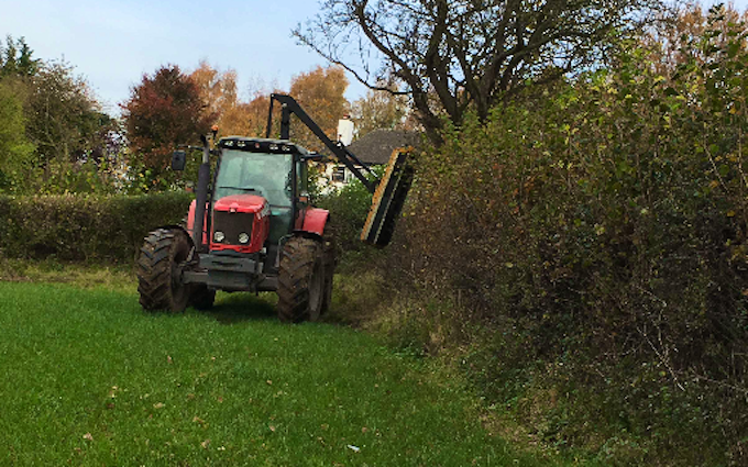 Maesllan with Hedge cutter at United Kingdom