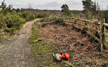 Wildscapes countryside contractors with Chain saw at Church Crookham