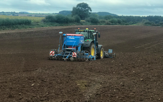 David marshall agricultural contractor with Drill at Albrighton