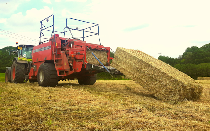 P.r, j.m & s.r houlston agricultural contractors with Large square baler at Glaisdale