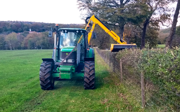 A & sj charlesworth farmers and contractors with Hedge cutter at Loxley